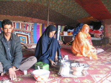 being welcomed with tea in a nomad's tent