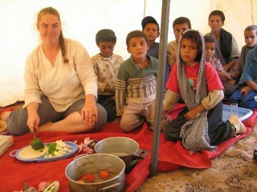 pg 49 - 'Within minutes, the tent is packed to the gills with children from the neighbouring tents'